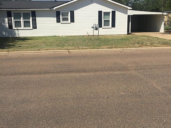 Side of house with carport