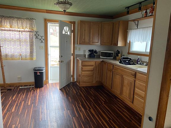 front door and kitchen