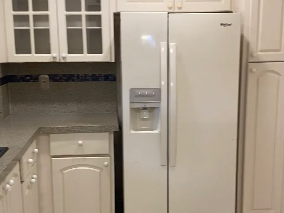 Full kitchen with dishwasher, full oven, stovetop range, refrigerator and breakfast nook.