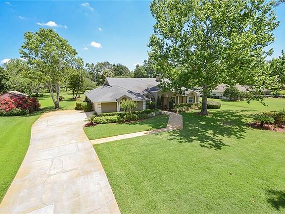 Long driveway provides plenty of parking for RV or boat