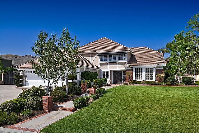 Elegant estate-like front yard of this beautiful home