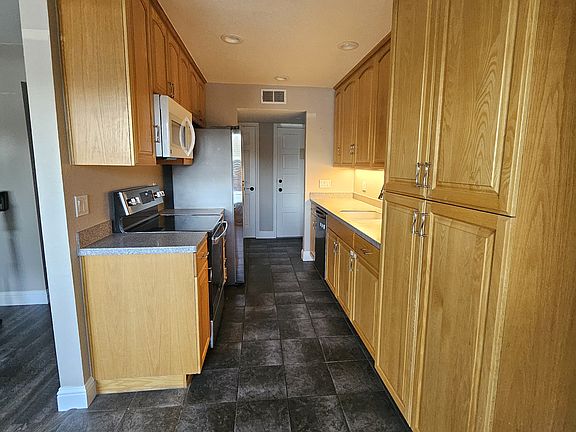 Kitchen with pantry and slide out drawers