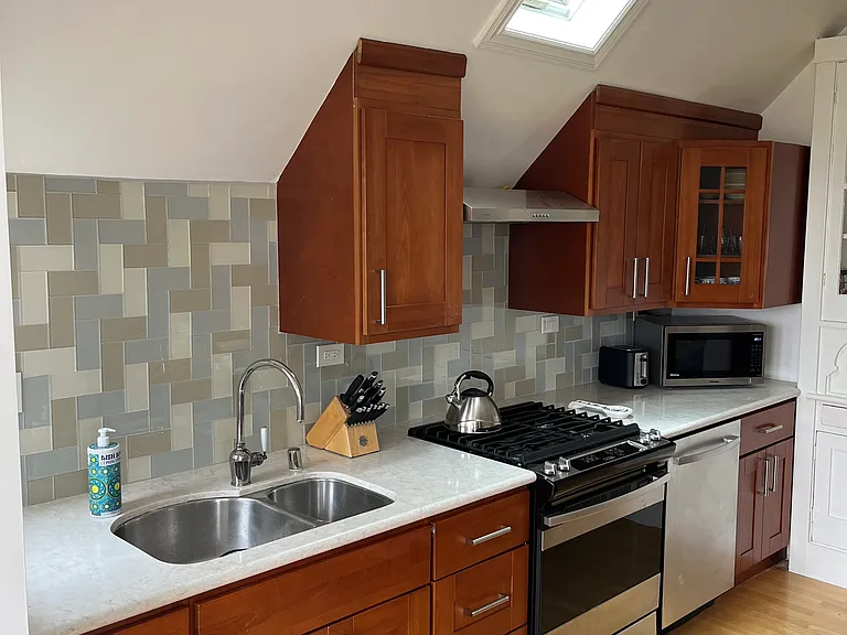 Kitchen- stove, dishwasher, microwave, toaster, lots of storage space