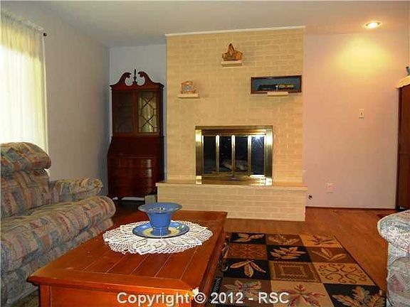 Living Room w/ Fireplace and Hardwood