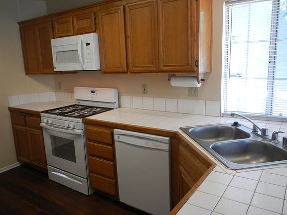 Self-cleaning gas range is brand new! Dishwasher and Microw