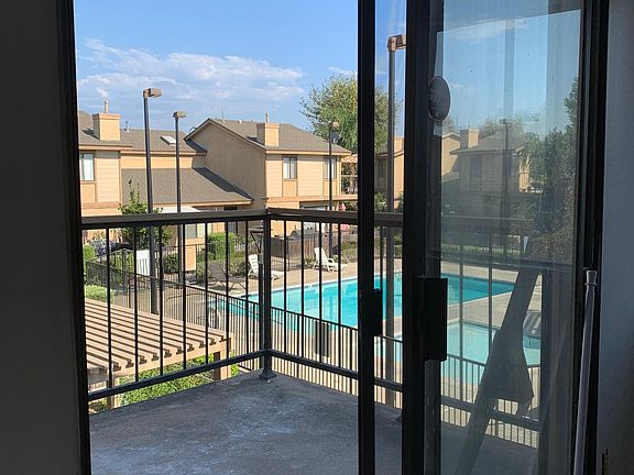 pool view from master bedroom with balcony