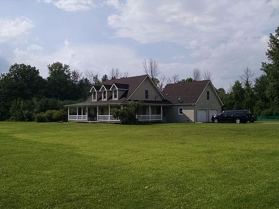 90 FEET OF WRAP AROUND PORCH