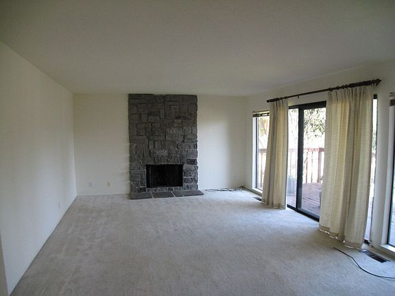 Family Room with Fireplace and yard access
