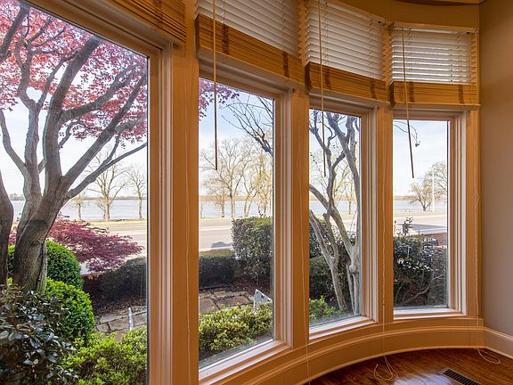 Living room windows facing the river