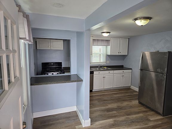 Fresh paint, new (back) door, two windows.