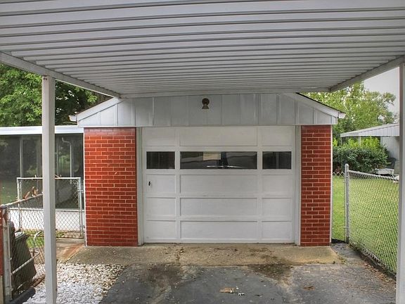 Detached garage and carport