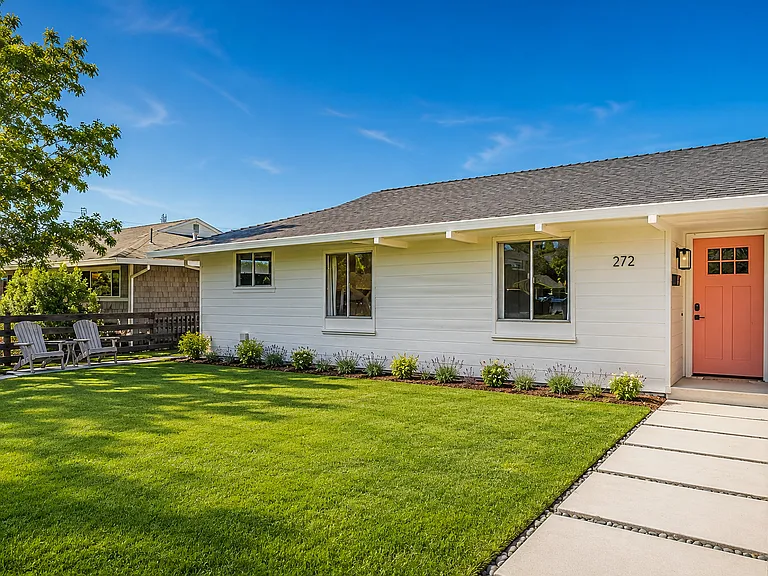 Beautifully updated home with fenced front yard and welcoming private entry.