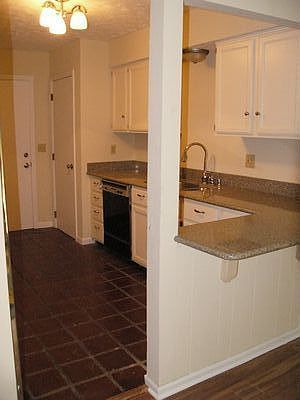 Kitchen. New indestructible quarts counters. New paint, lighting.