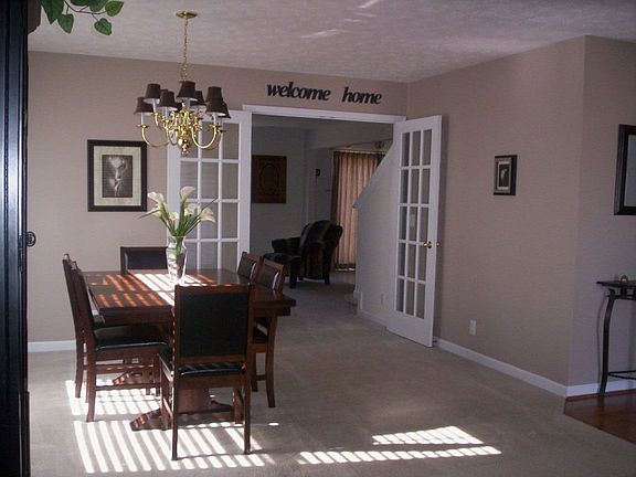 Spacious Dining Room with French Doors that lead to Living Room