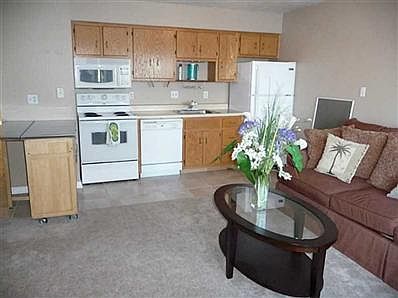 Kitchen. Kitchen is small but mighty and has everything you will need, we added the extra island for storage and counter space which is convenient if you have as many guests as we did every weekend