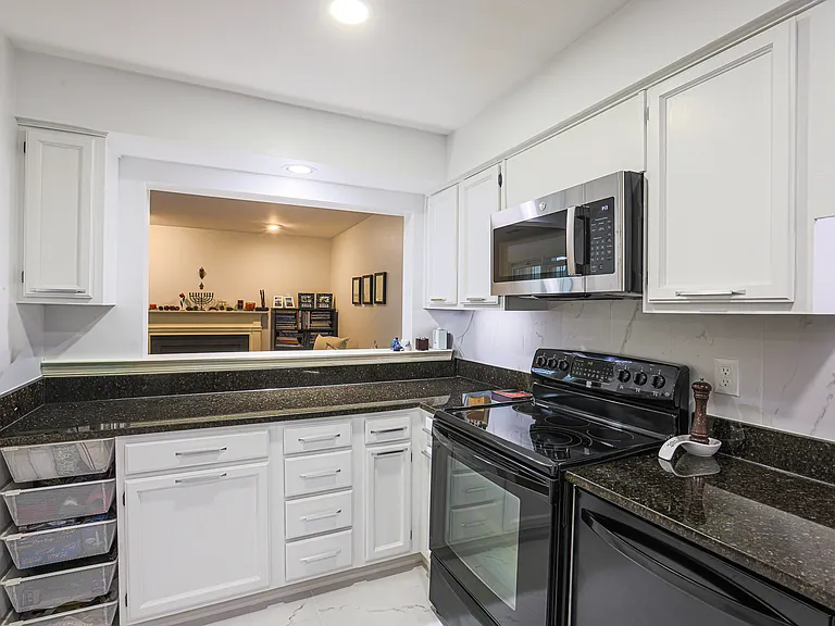 5715 Brewer House Cir #201 — Photo 12