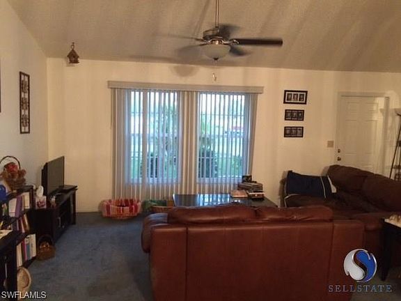 Living room has Cathedral ceiling