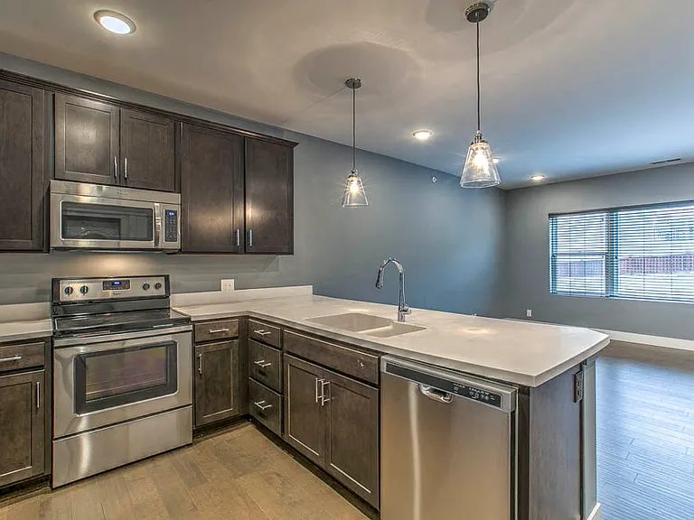 Modern kitchens are designed with sleek finishes and high-end appliances for a polished, functional space.