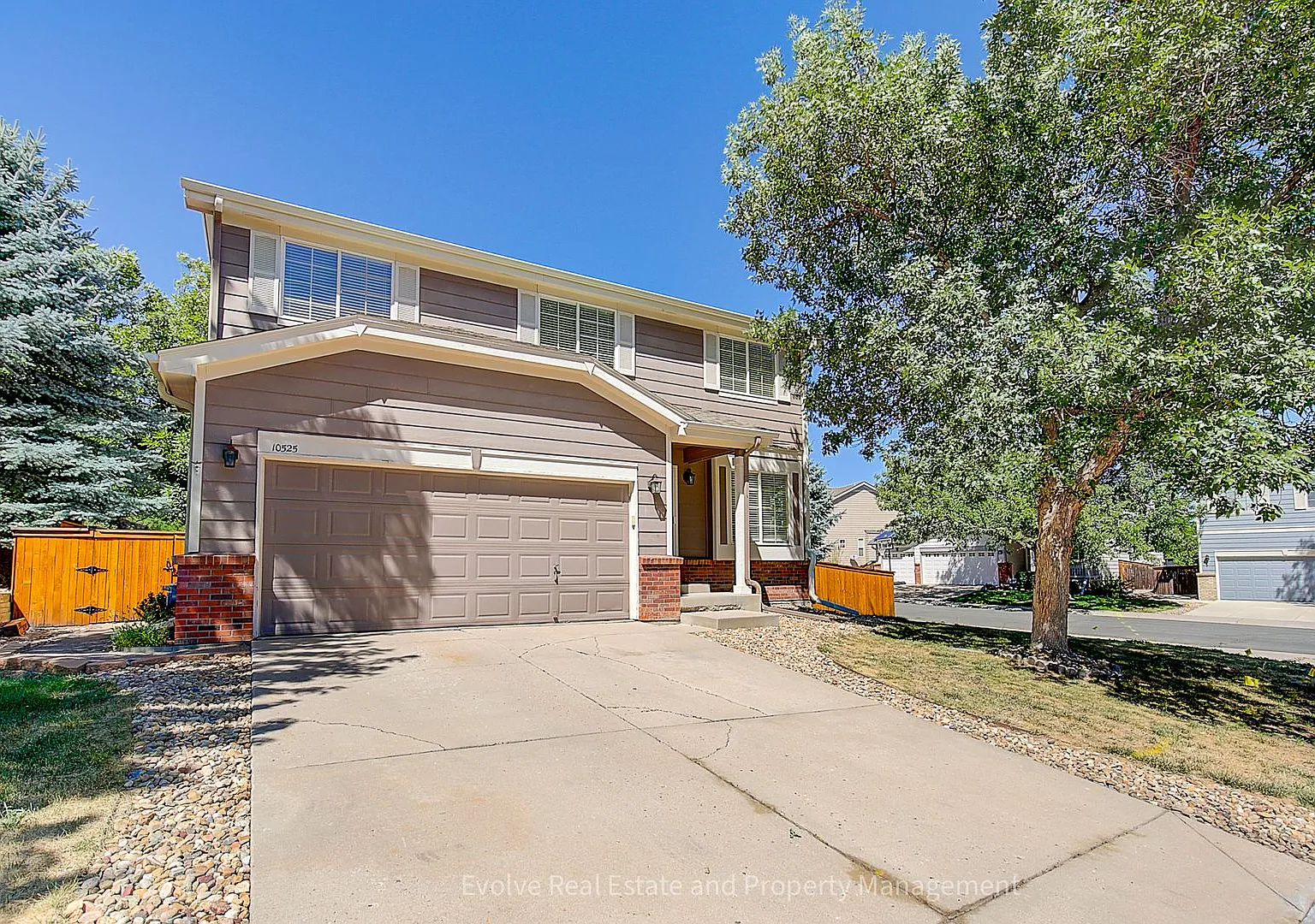 Evolve Real Estate: Beautiful 4-Bedroom Home in Lone Tree with Finished Basement! Available Septe... — Photo 3