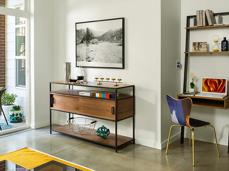 Apartment living room with polished concrete flooring.