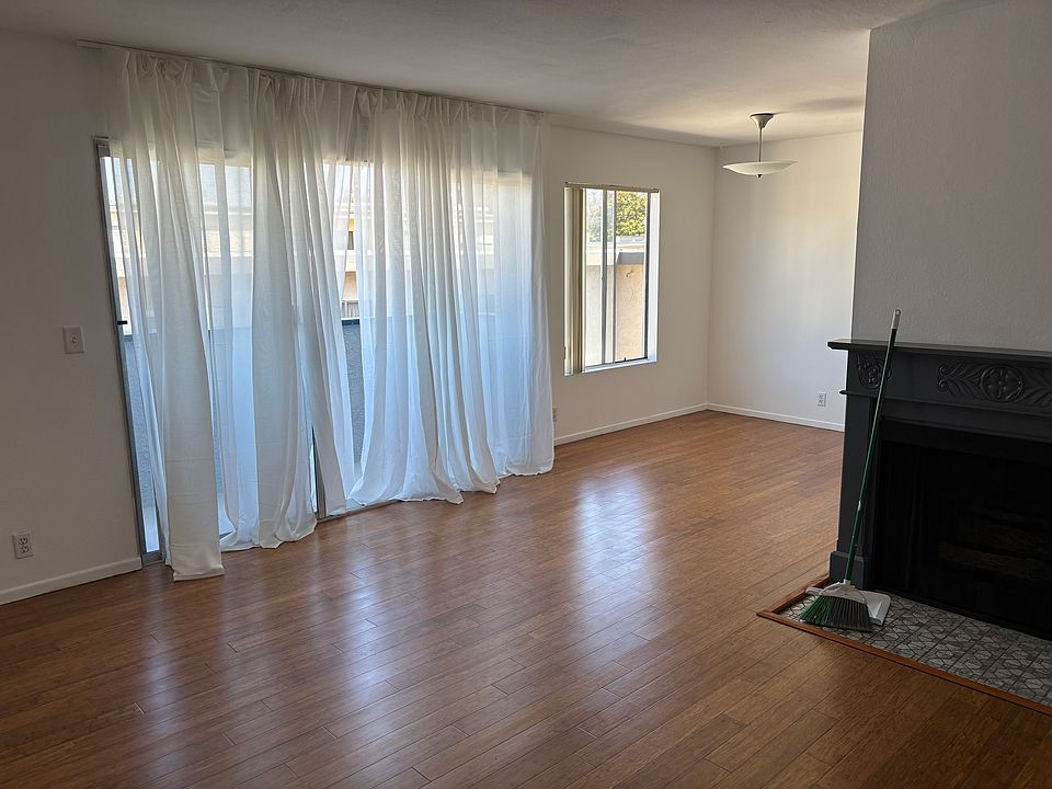 View from entering the apartment 
Entrance tp balcony. firplace and dining area