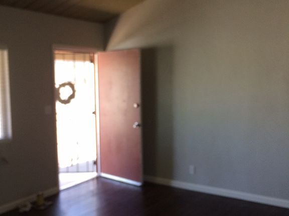 Main room with ceiling fan