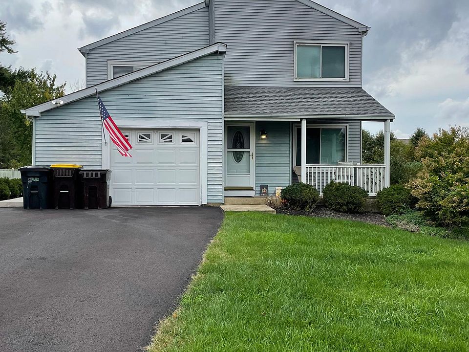 Driveway parking and Unit A's entrance