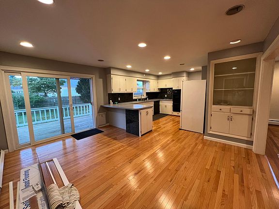 open dining kitchen area. Large opening to LR on right