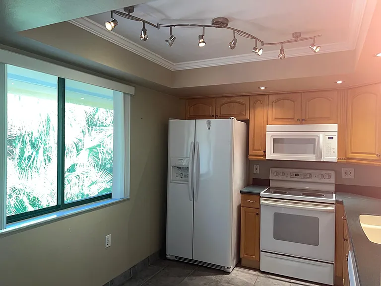 Kitchen with window overlooking the community pond