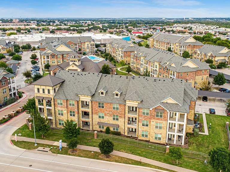 Enjoy resort-style living with a sparkling pool at Auberge of Burleson in Burleson, TX.