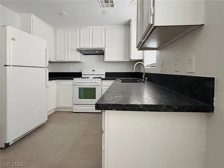 7859 Treasure Ship Ave — Photo 4