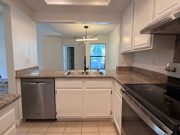 Kitchen with new appliances/fixtures