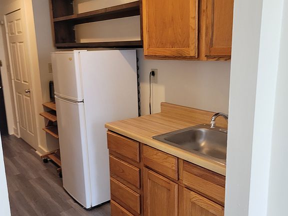 kitchenette with refrigerator