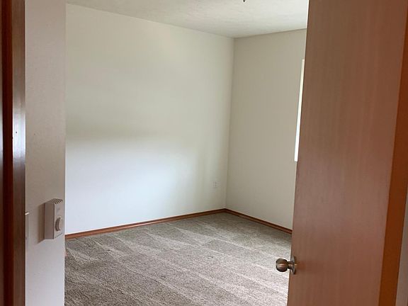 Master bedroom with a full closet