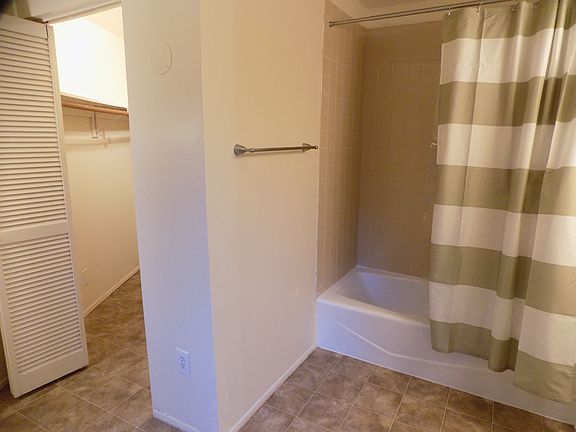 Bath recently refinished. New hardware in shower and bathroom.