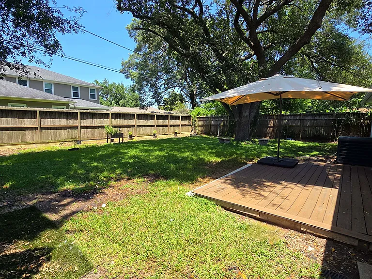 Other view of inviting backyard. You can start to plant your own garden. Already have some citrus and plum trees.