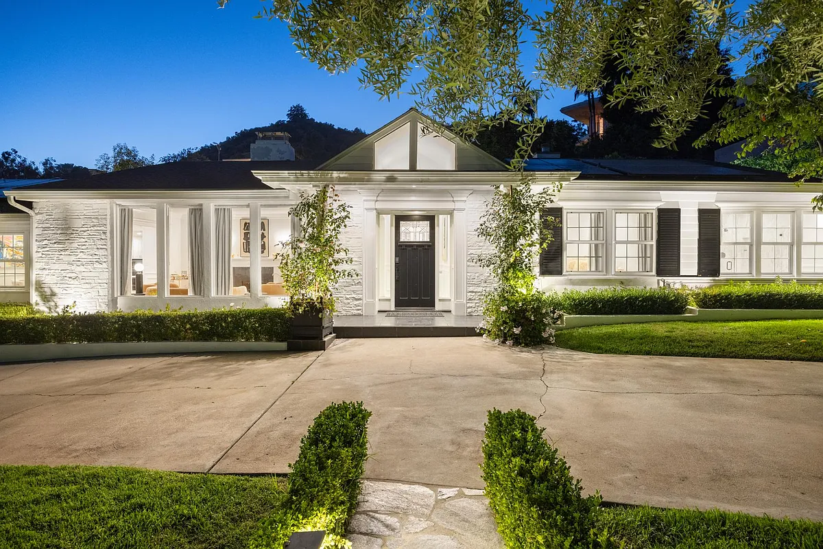 Photo 2 of 76 - 1829 Coldwater Canyon Dr - Beverly Hills, CA Approach the front of the house, where luxury meets serenity in this exclusive Beverly Hills estate. - 1829 Coldwater Canyon Dr