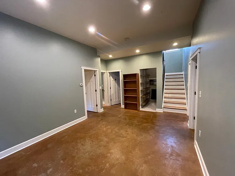 First floor media room connects 3 large bedrooms, bath and laundry room.