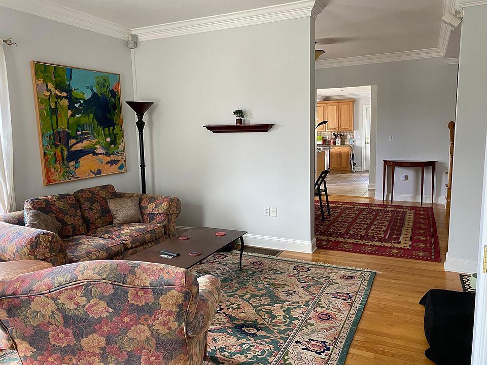Living room (view of first floor flow of floor plan)