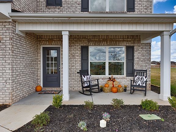 The McGinnis- Front Porch. Home under construction. Sample floor plan photo used for illustrative p