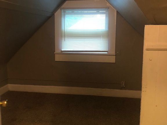 Unit 6 - Bedroom 1 or Living room area with closet/storage area.