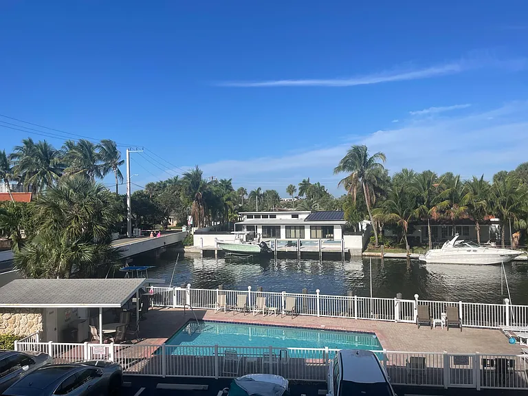 Pool and canal in back of building