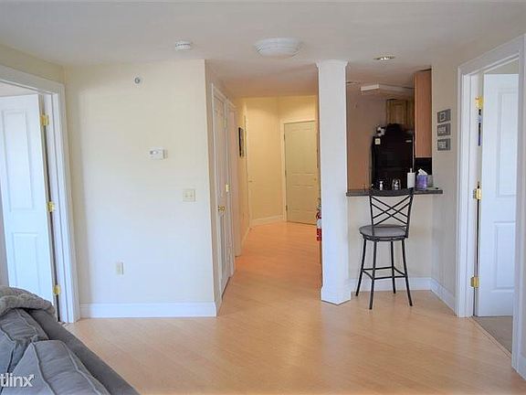 Living down hall to exit door