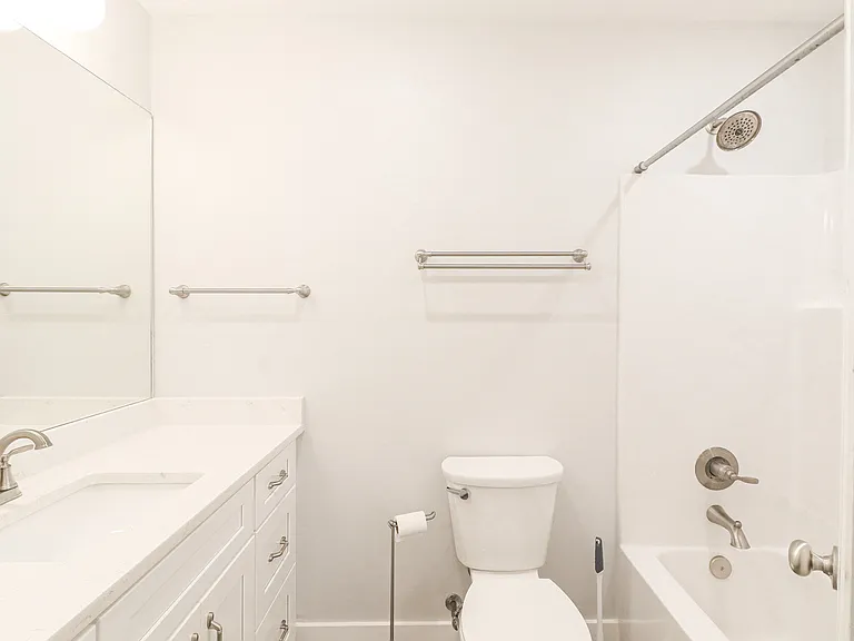 2nd bath located in the hall near spare bedrooms