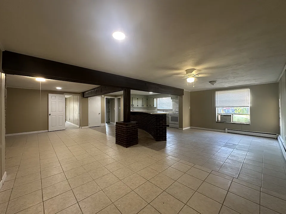 Open oversized living space with LR, Dining, Kitchen