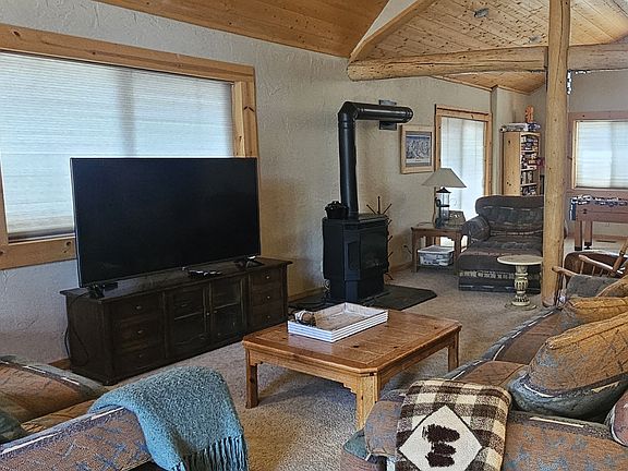 Open Concept Living Room with thermostat controlled Gas Fireplace