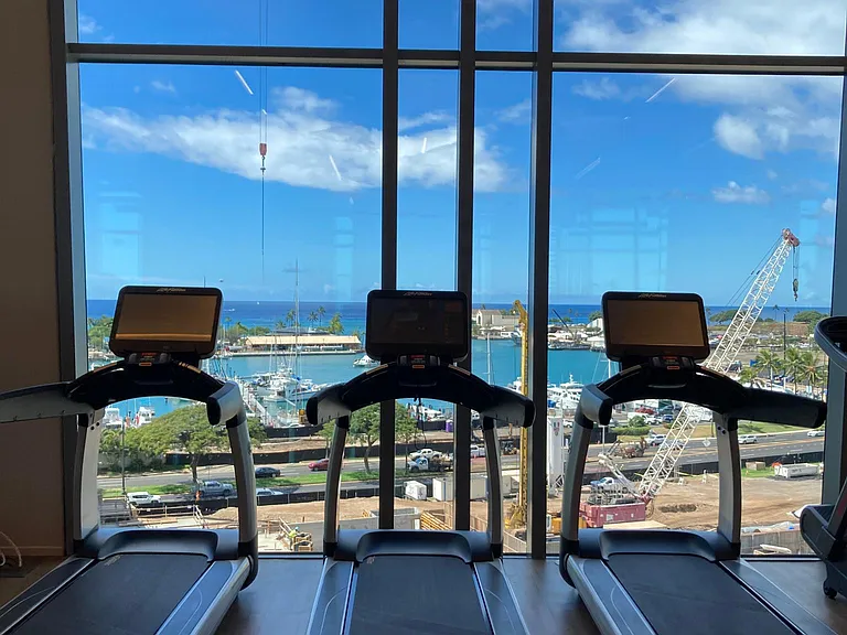 Indoor gym with ocean views