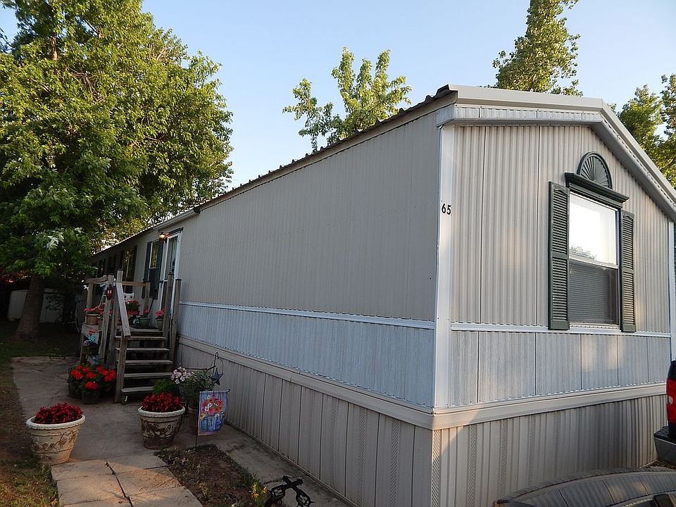 1st image of 400 S Ranchwood Blvd Trailer 65