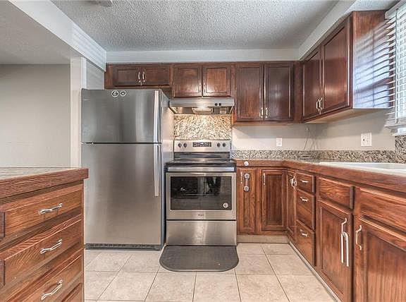 3rd image of 11823 E 59th Terrace Cir
