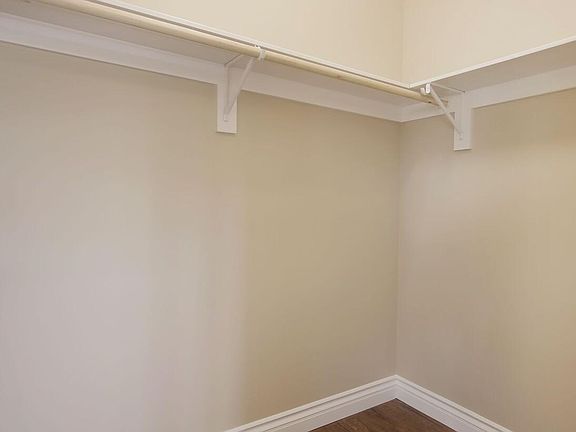 Large Walk-in Closet. Can fit a dresser inside.